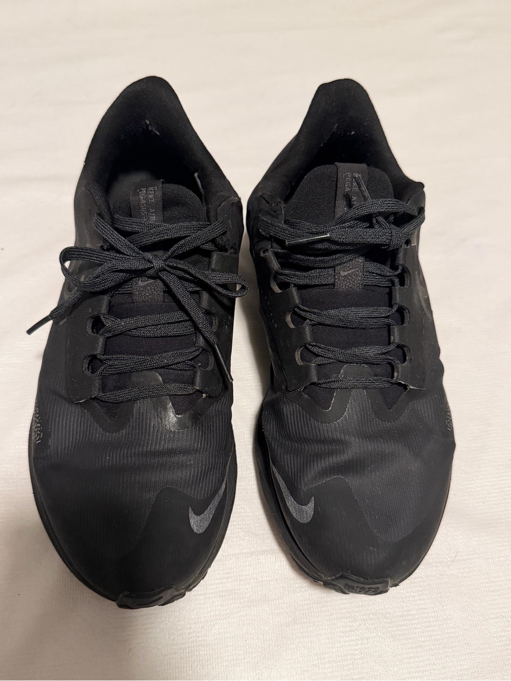 Nike Air Zoom Pegasus 39 Sheild Women’s All-Black Athletic Sneakers